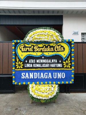 Papan Bunga Duka di Pulau Maya